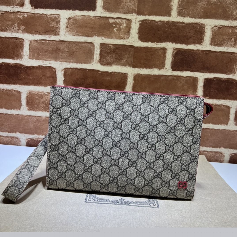 G*u*i clutch bags
